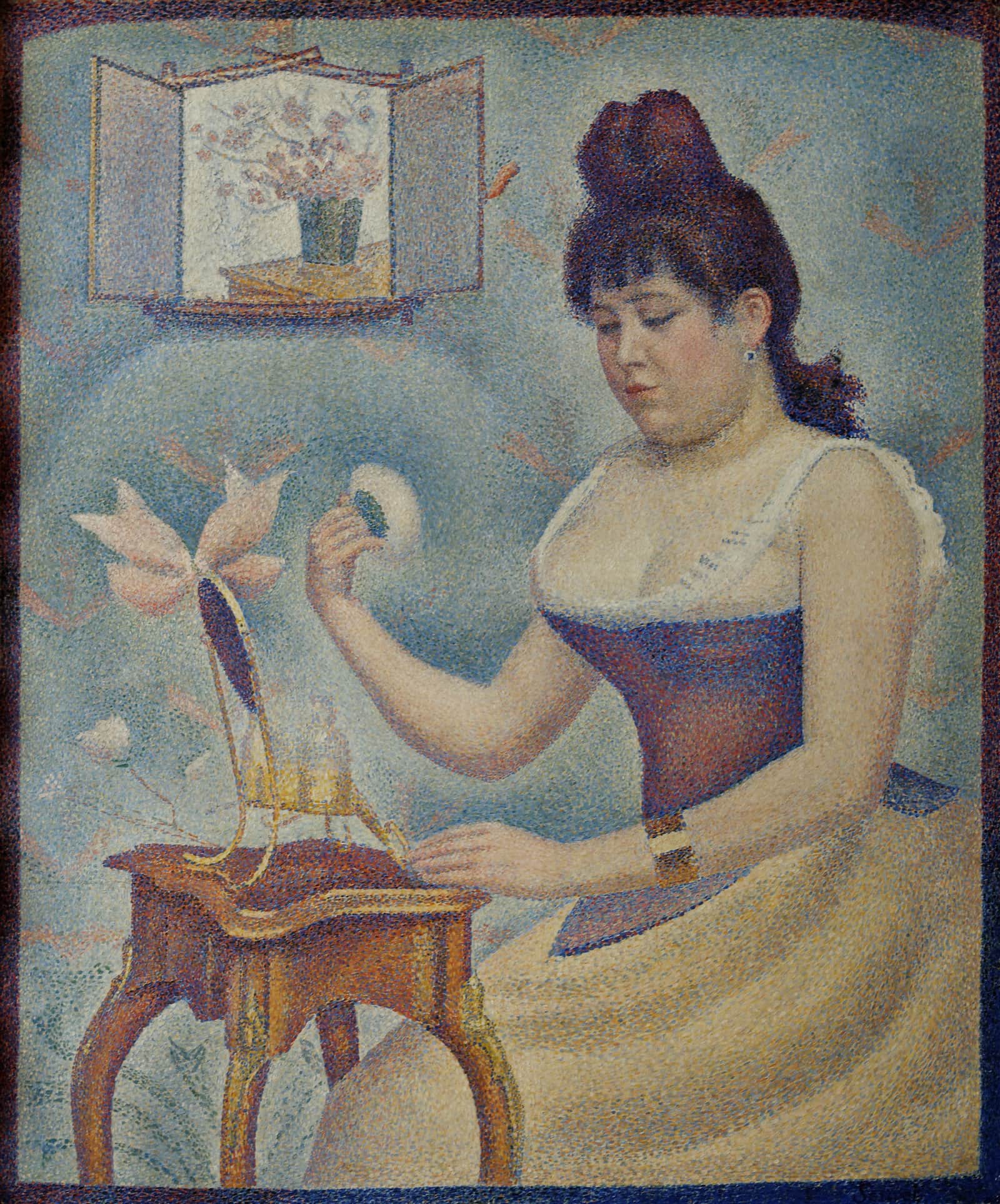 Young Woman Powdering Herself