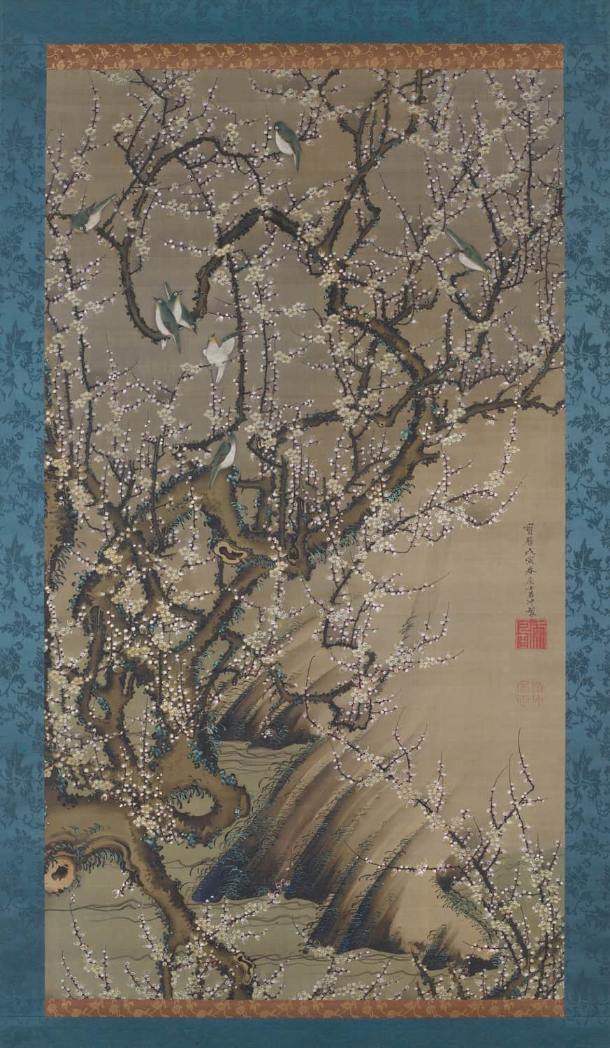 Birds on blossoming plum